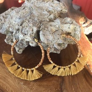 On the town tassel dangles